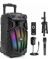 Front view of Pyle portable PA speaker with accessories (microphone, remote, charger, tripod)