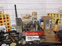 Overall lot showing radio, bingo cards, toy car case and various collectibles