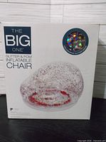 Front of retail box showing chair image and branding