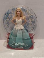 Front view of boxed 2016 Holiday Barbie doll