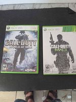 Front view of both Xbox 360 Call of Duty game cases