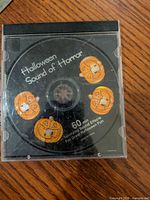 Front of jewel case showing disc artwork with jack-o’-lanterns and title