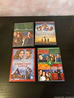All four DVD cases front covers