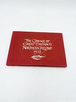 Closed red folder front with title text