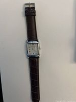Front view of Emporio Armani wristwatch showing dial, case shape and strap