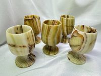 Group of five onyx goblets front view