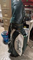 Full view of Augusta branded green and white golf bag with hood attached