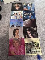 All ten LP record jackets laid out front-side up