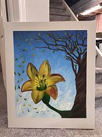 Front view of acrylic floral landscape painting leaning on stairs