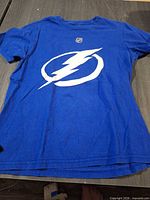 Front view showing lightning bolt logo and overall condition