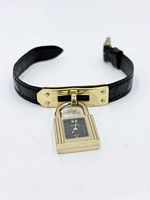Full view of padlock wristwatch with strap