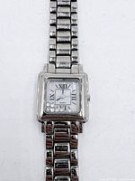 Front view of watch showing dial, crystals, bracelet