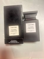 Front view of bottle and box showing labels
