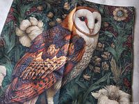 Front view of pillow cover showing barn owl design and foliage background