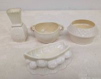 All four Belleek pieces group view