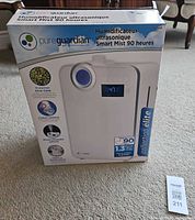 Front of retail box showing PureGuardian H7550 humidifier image and specs