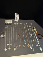 Entire lot layout showing all jewelry items and trinket box