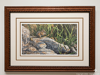 Full view of framed lithograph in ornate frame