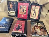 Group shot of all six VHS tapes