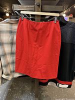 Front view of red skirt hanging