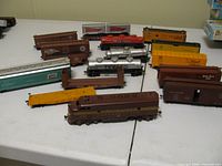 Group view of locomotive and freight cars on table