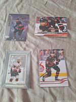 Front view of all four Claude Giroux Ottawa Senators cards