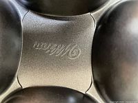Wilton logo and nonstick finish detail inside skull pan