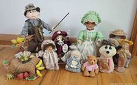 Group shot of all dolls, plush and figurines