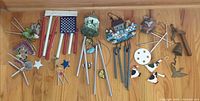 Overview of all seven wind chimes laid on floor