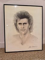 Entire framed portrait drawing in metal frame