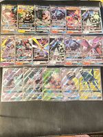 Full view of 17 GX cards in binder sleeve pages