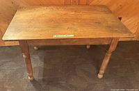 Full view of pine dining table with turned legs