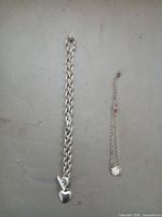 Full view of necklace and bracelet laid flat