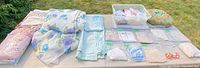 Complete lot laid out on table outdoors