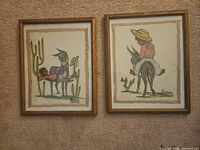 Both framed artworks side by side