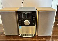 Front view of complete Sony CMT-EH10 system with both speakers