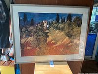 Full view of framed landscape print