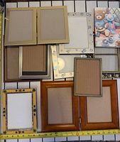 Group shot of all ten frames with measuring tape