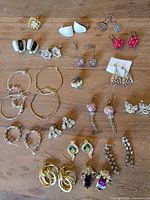 Overview of all earrings arranged on table