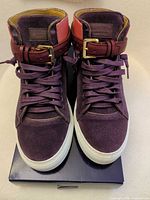 Front view showing overall design, laces, tongue branding BUSCEMI, strap and buckle