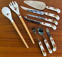 Group shot of all nine Royal Albert Old Country Roses utensils