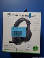 Front of retail box showing product image, brand and model