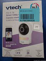Front of retail box showing VTech RM9761 camera image and branding
