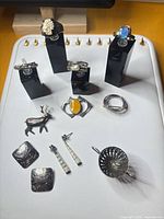 Group shot showing all jewelry pieces and miniature bowl