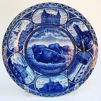 Front view showing full design of souvenir plate