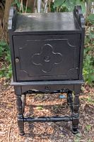 Full front view of cabinet showing overall form and finish