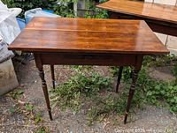 Full view of pine side table top and legs