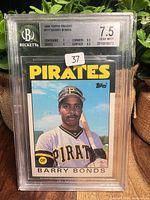 Front of Beckett-slabbed 1986 Topps Traded Barry Bonds card showing grade 7.5 and subgrades