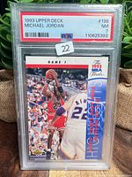 Front of PSA slab with label and front of card