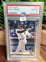 Front of PSA-slabbed 2019 Topps Eloy Jimenez rookie card showing grade label